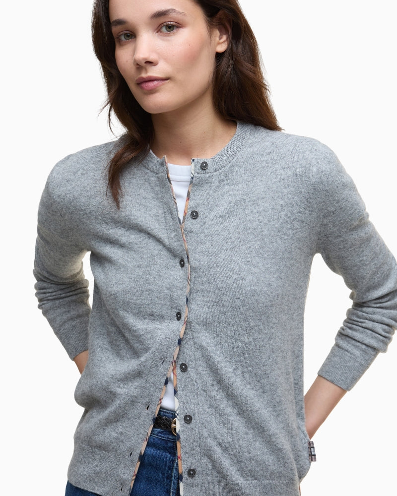Side angle of women's Barbour Pendle cardigan highlighting soft sleeve and tailored shape
