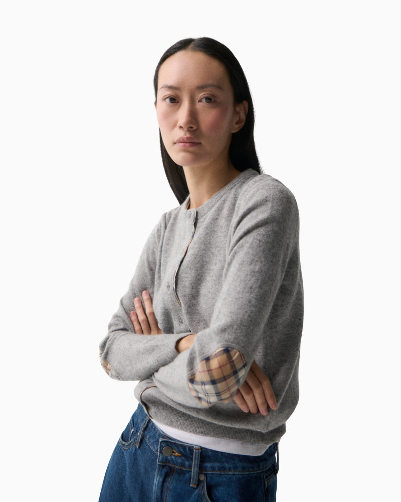 Barbour Pendle cardigan worn over a casual outfit showing lightweight layering style