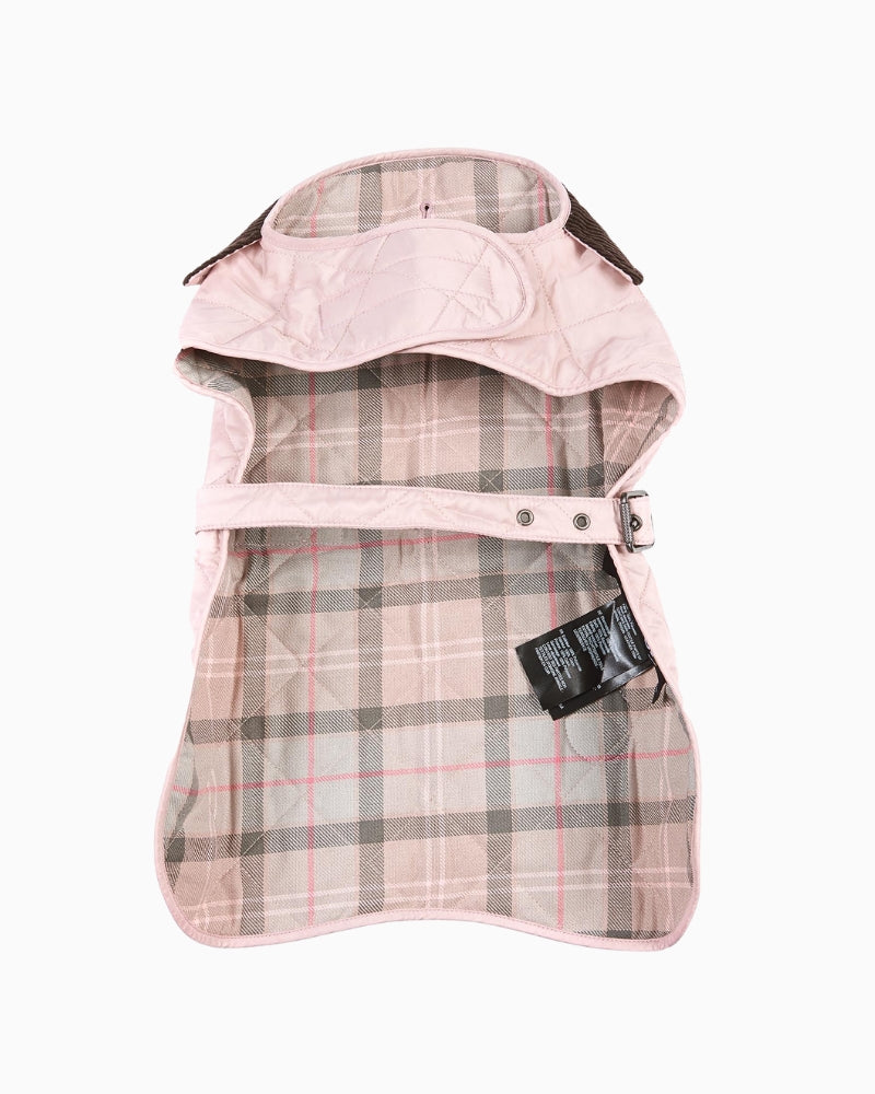 Barbour quilted dog coat in pink displayed flat with lining visible