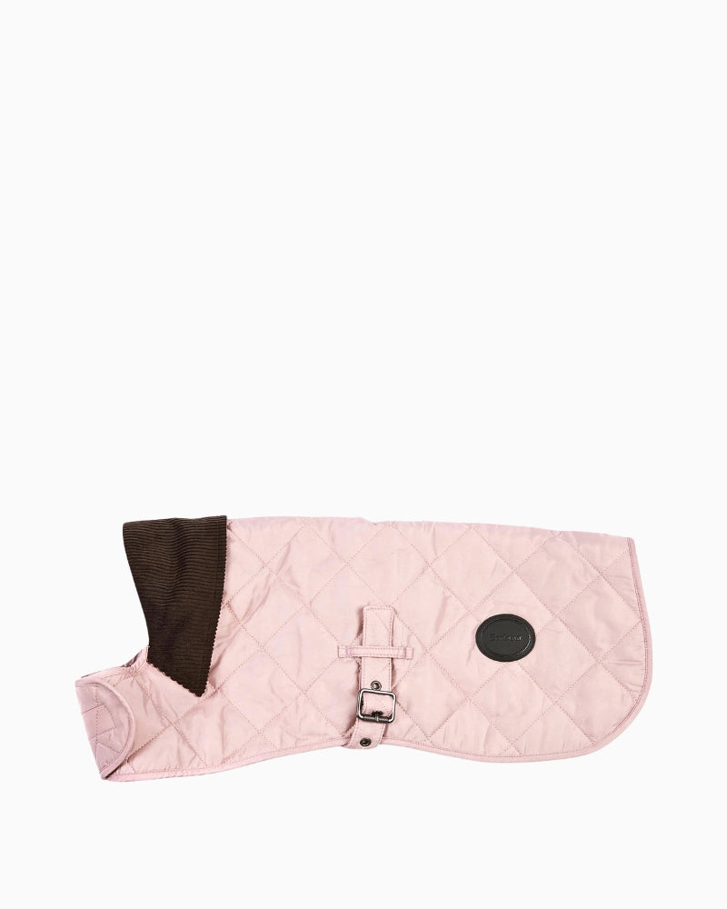 Side view of Barbour pink quilted dog coat with embossed badge