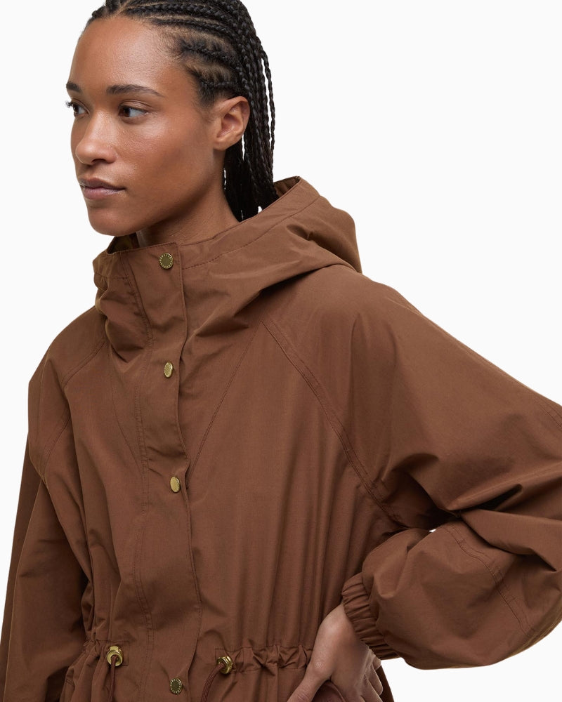 Close-up of Barbour Sidney Waterproof Parka showing gold buttons