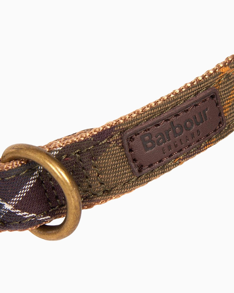 Close-up of Barbour embossed badge on tartan dog collar