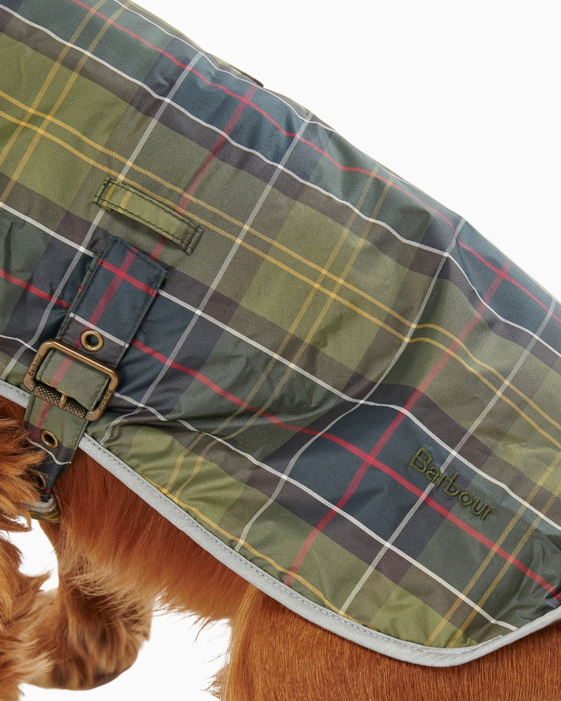 Close-up of cord trimmed collar and tartan outer fabric on Barbour dog coat