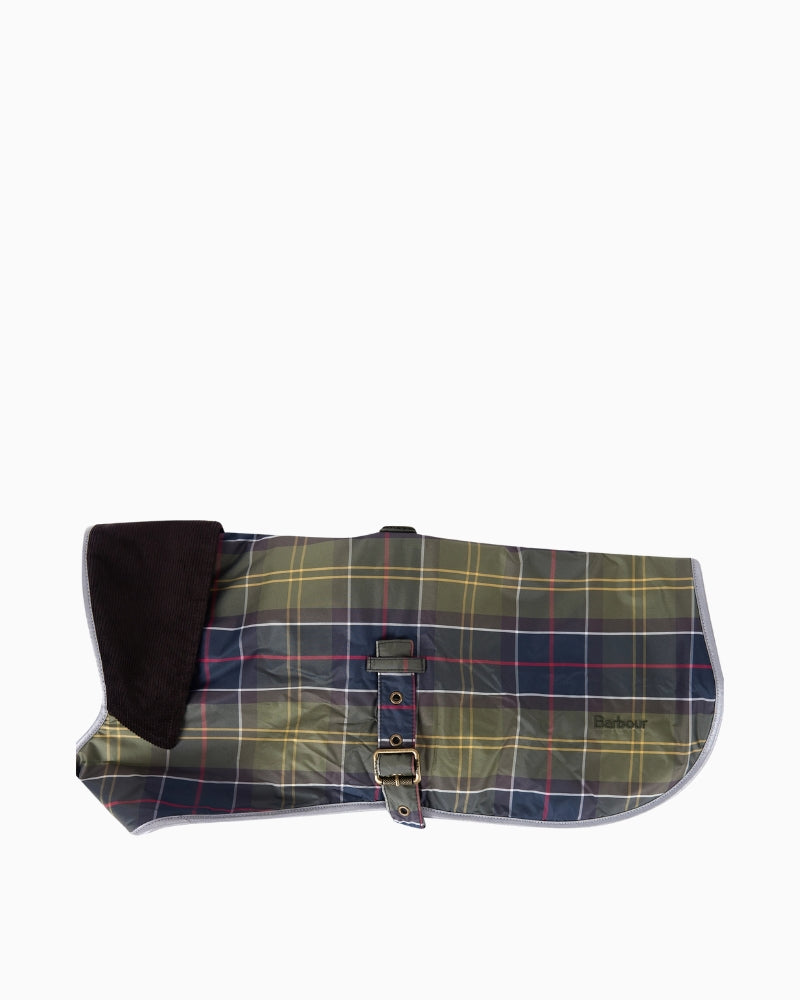 Side view of waterproof tartan dog coat showing reflective trim and adjustable straps