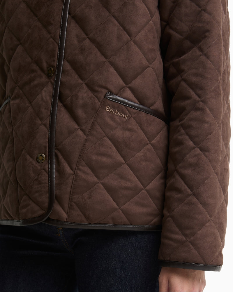 Barbour quilted jacket dark brown button front pocket detail