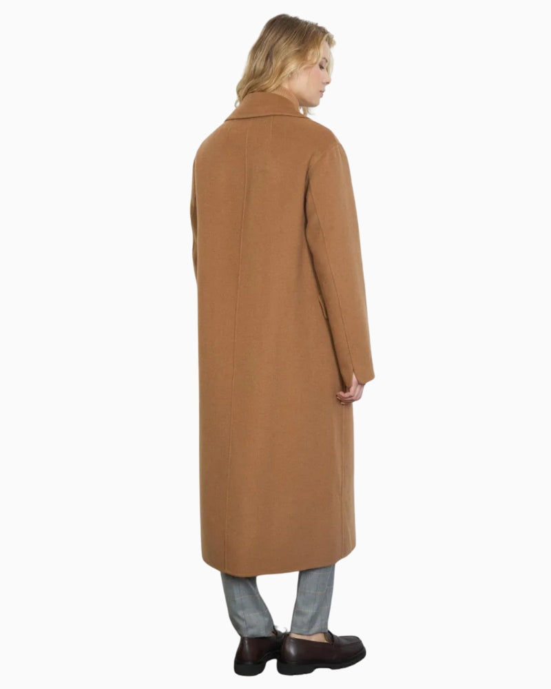 Back view of Caraca longline coat with clean seam detailing