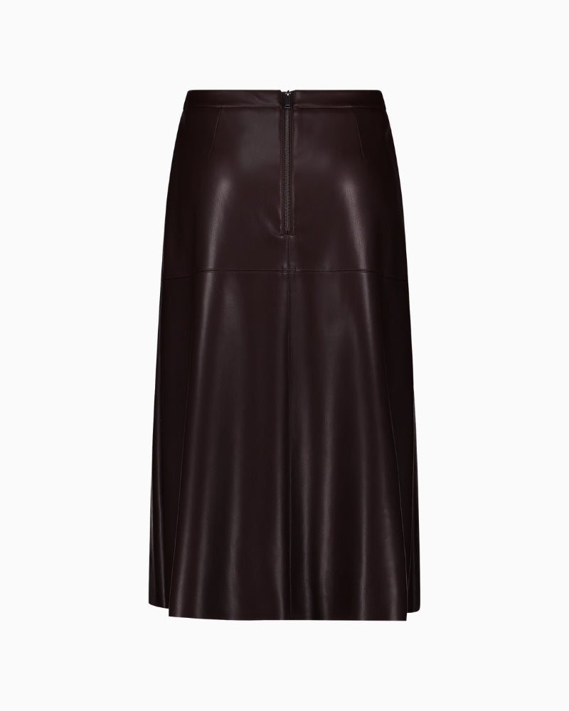 Front view of Betty Barclay faux leather A-line skirt with slash pockets and midi length