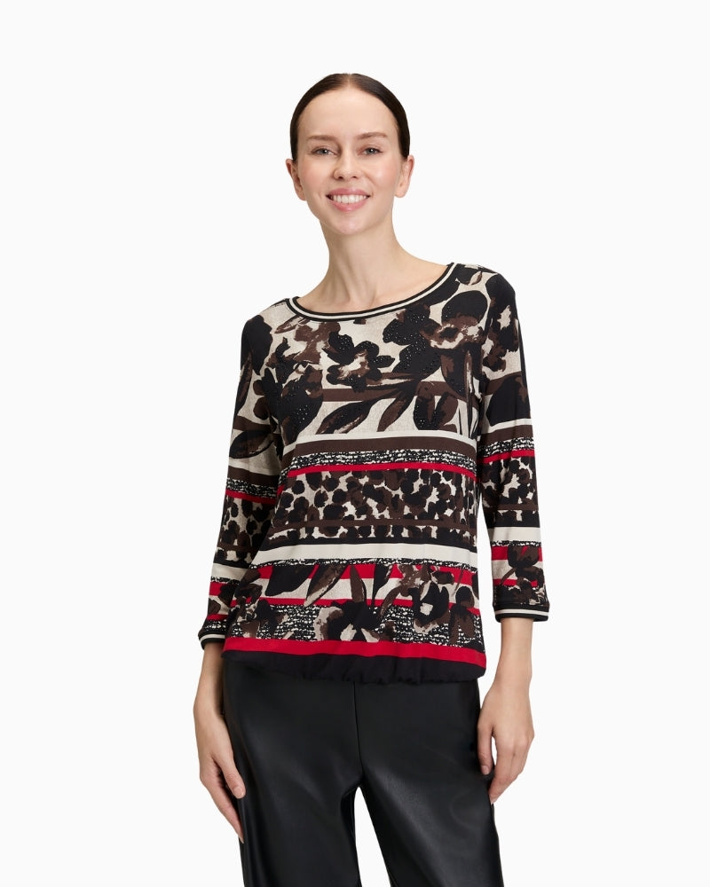 Front view of Betty Barclay floral jersey t‑shirt with bateau neckline and 3/4 sleeves