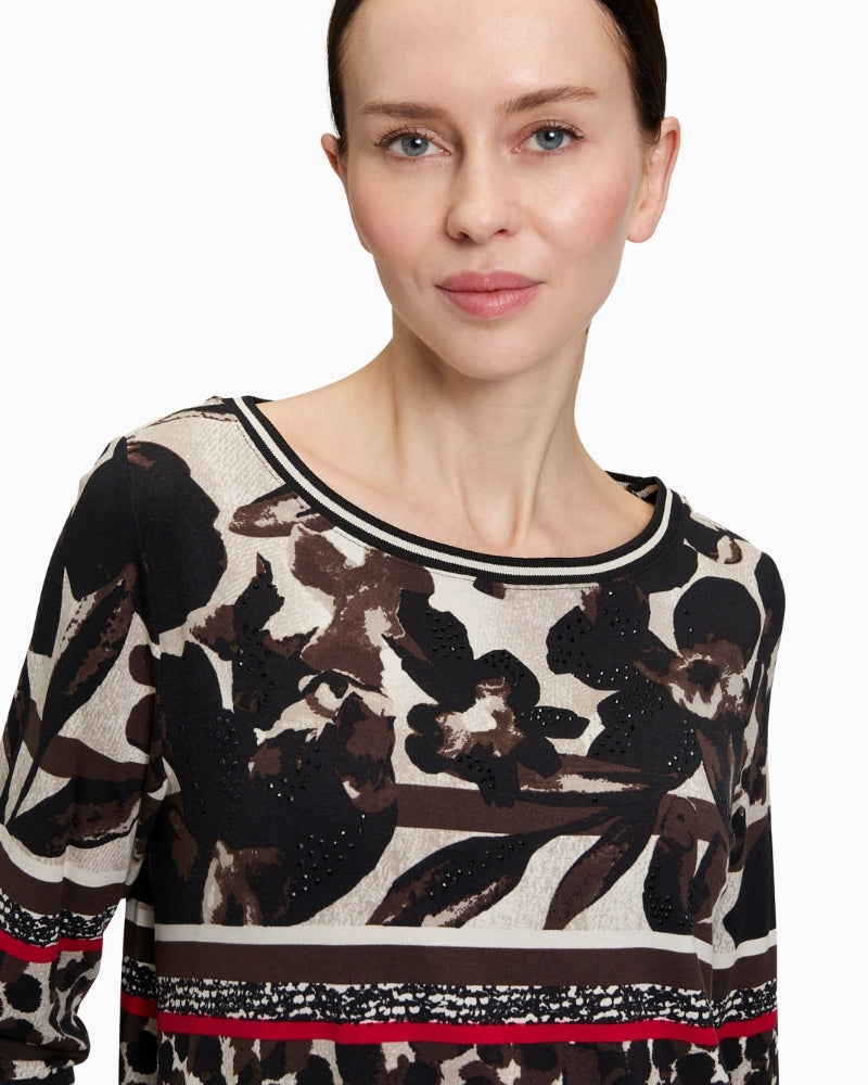Close-up of bateau neckline and sleeve detail on Betty Barclay floral t‑shirt