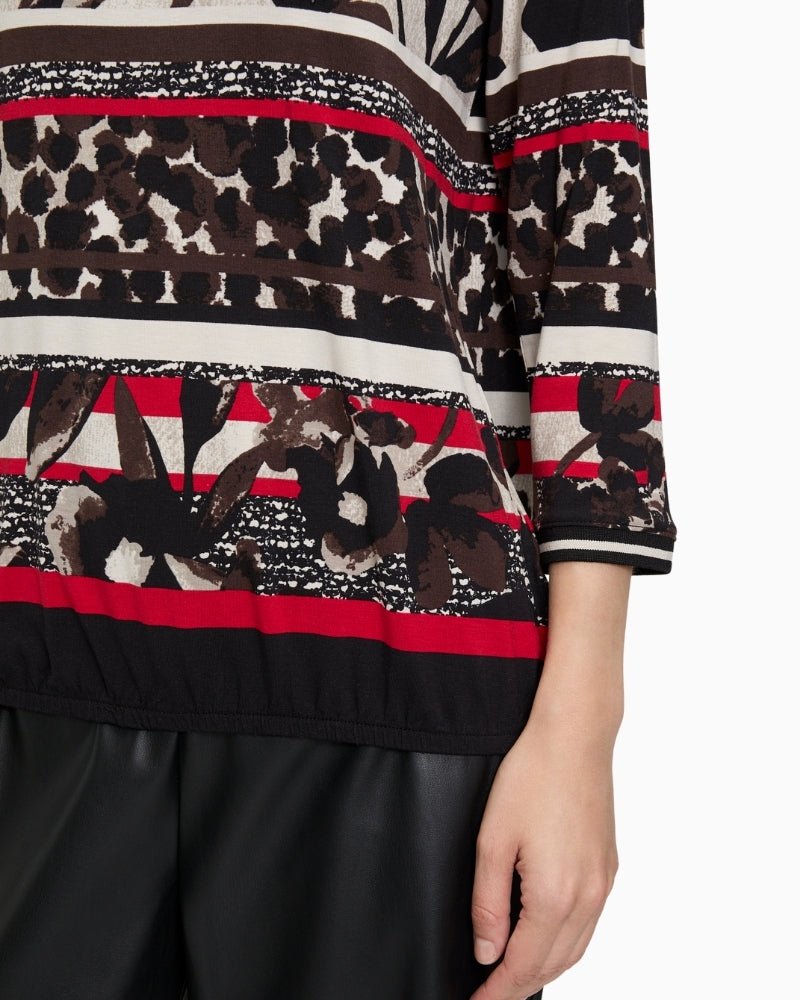 Close-up of bateau neckline and sleeve detail on Betty Barclay floral t‑shirt