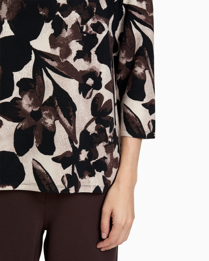 Close up of Floral print sweatshirt by Betty Barclay with ¾ sleeves and bateau neckline