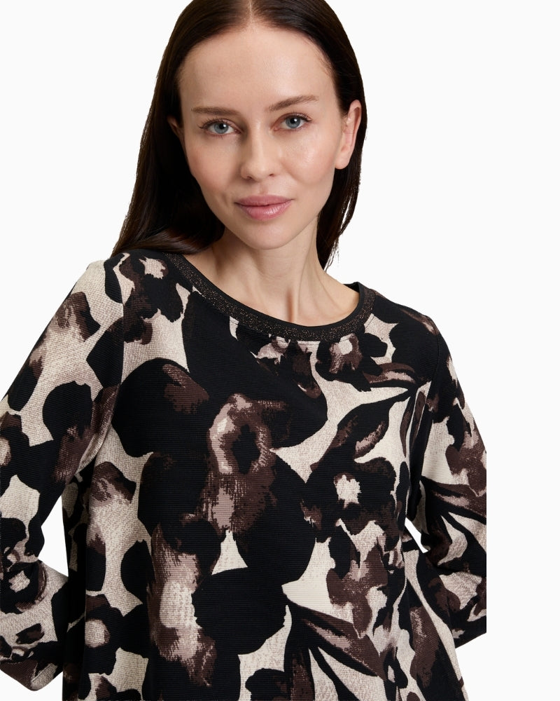 Close up of Floral print sweatshirt by Betty Barclay with ¾ sleeves and bateau neckline