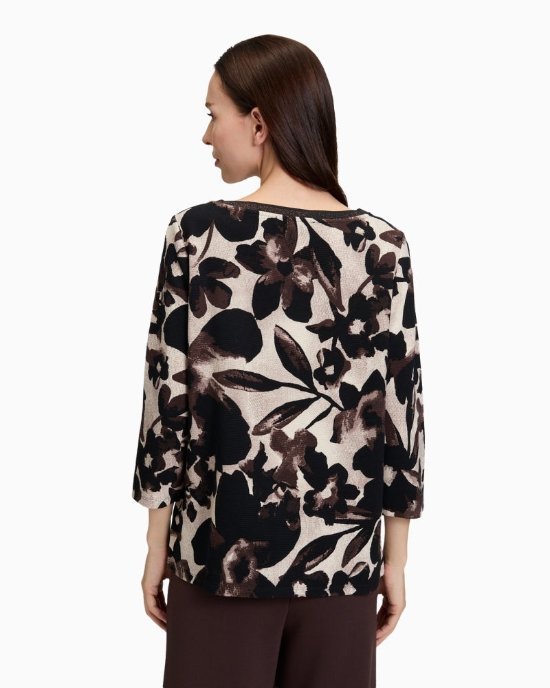 Back view of soft floral sweatshirt showing straight fit and smooth fabric