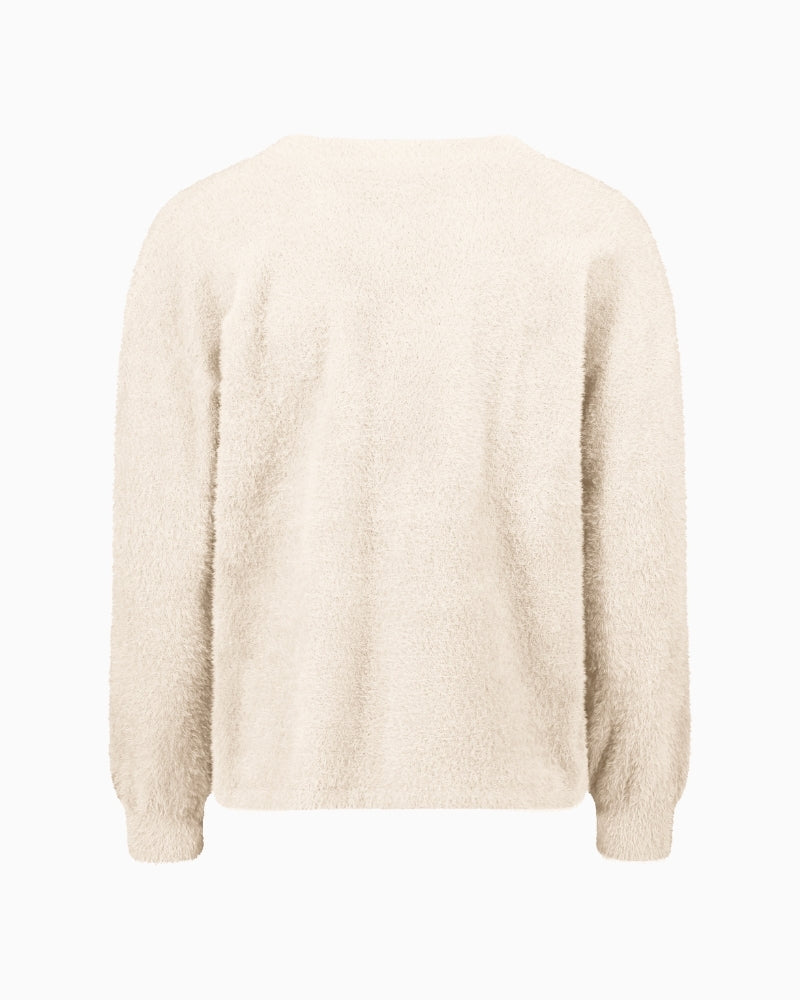 Back view of long-sleeve knit jumper showing relaxed fit and solid colour