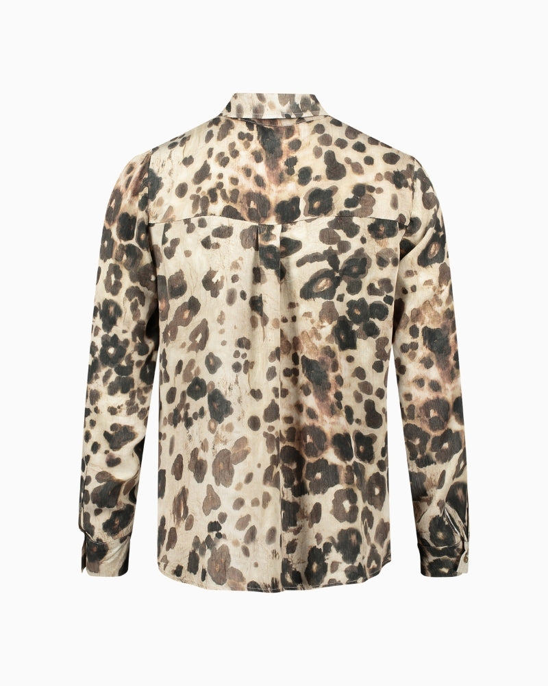 Back view of soft viscose blouse showing figure-skimming fit and long sleeves