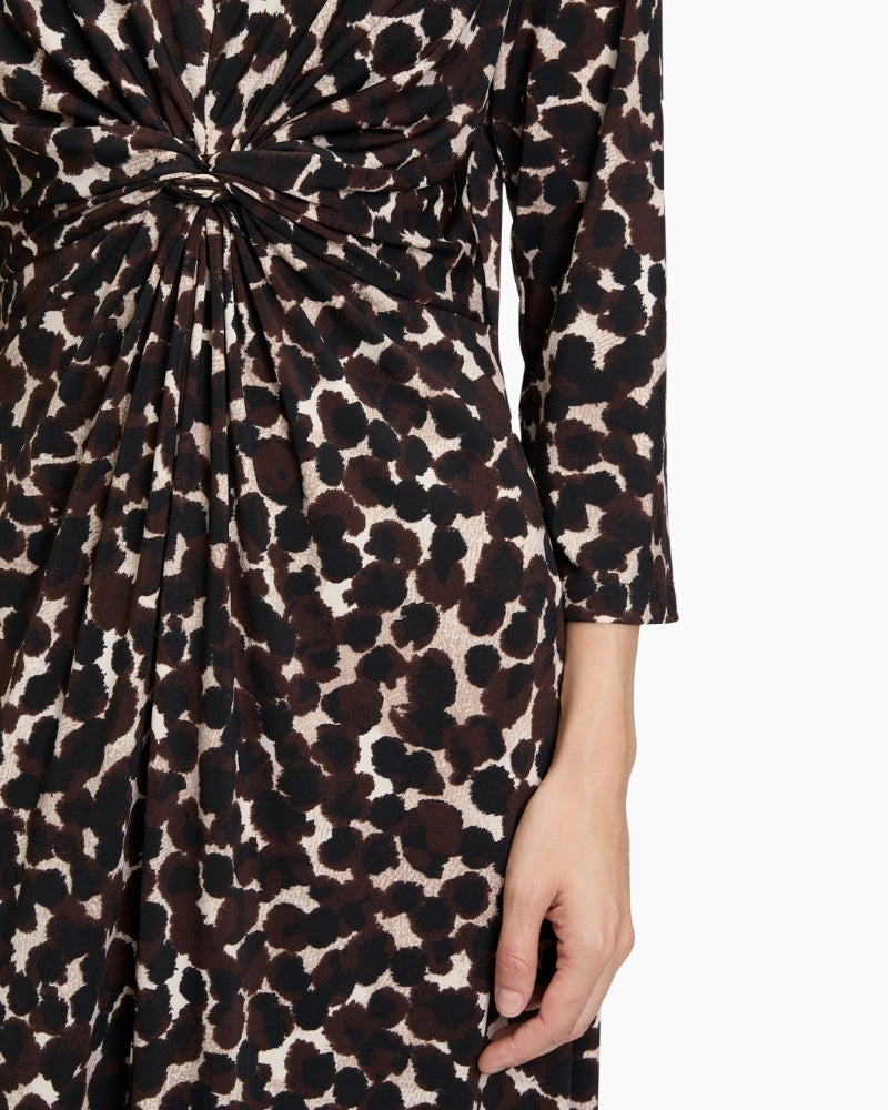 Close up of Polka dot midi dress by Betty Barclay with gathered V-neck and ¾ sleeves