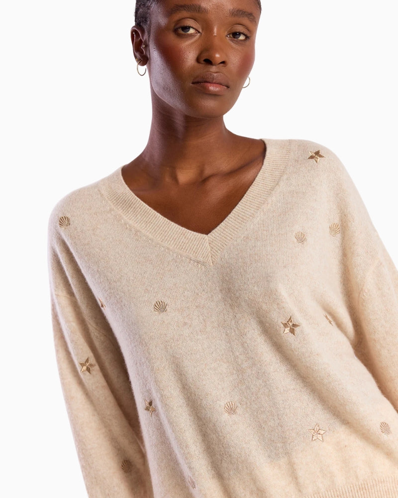 Brodie Cashmere Sea Embroidery Cashmere V Neck Jumper beige neckline detail