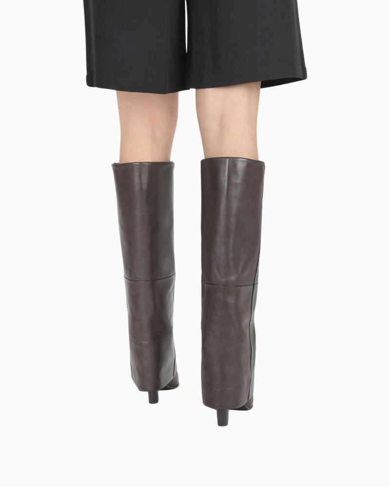 Tall brown leather skirt boots by BRONX with banana heel