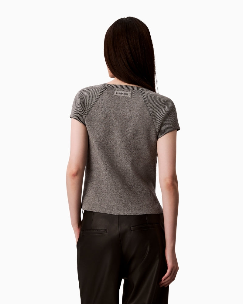 Back view of grey sleeveless knit with ribbed trims