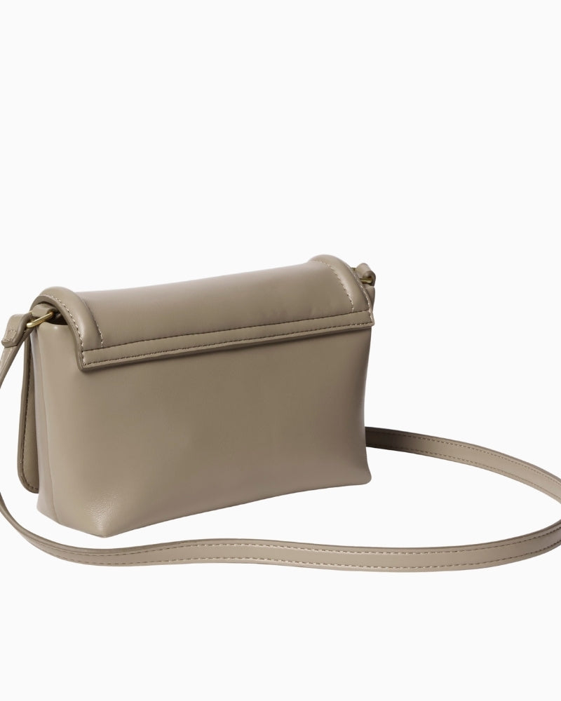 Back view of compact taupe CK crossbody with adjustable strap