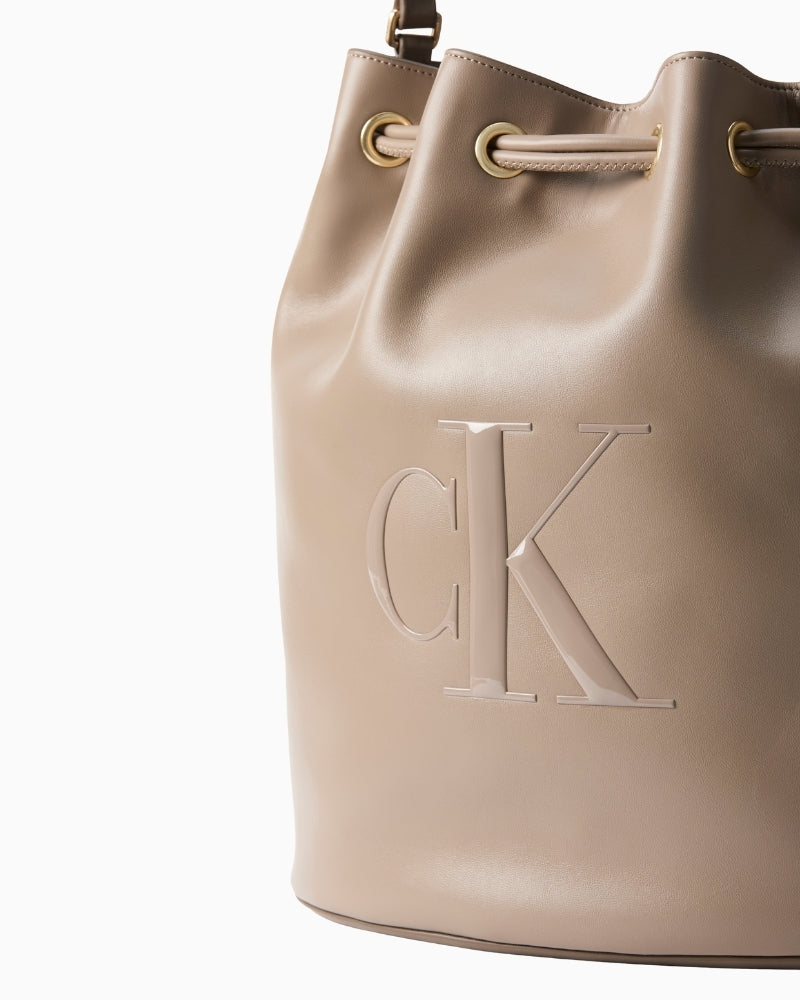 Calvin Klein taupe bucket bag embossed CK logo detail – Áines Boutique