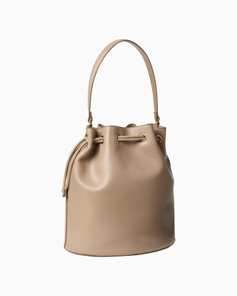 Calvin Klein taupe bucket bag angled side view – Áines Boutique