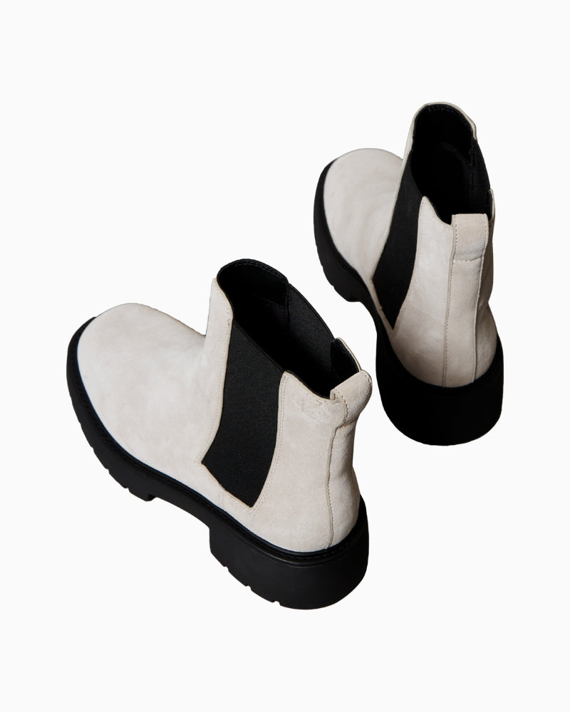 Back or angle shot highlighting tab and chunky tread