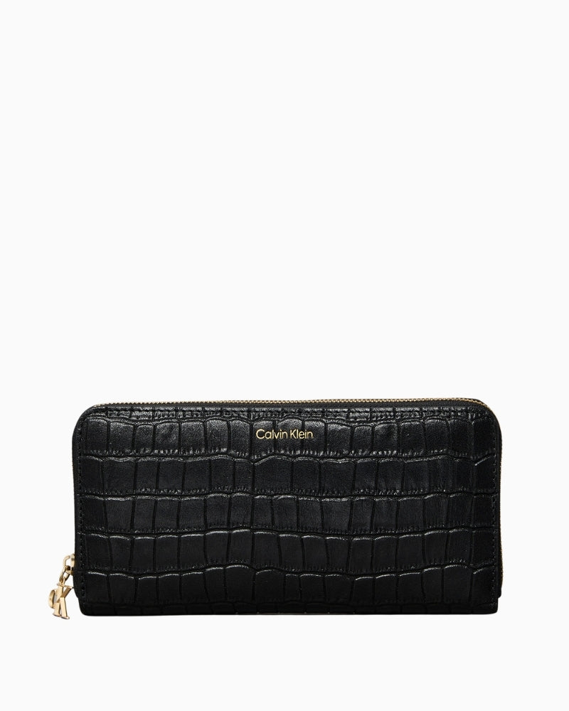 Front view of Calvin Klein black croc‑embossed long zip‑around wallet
