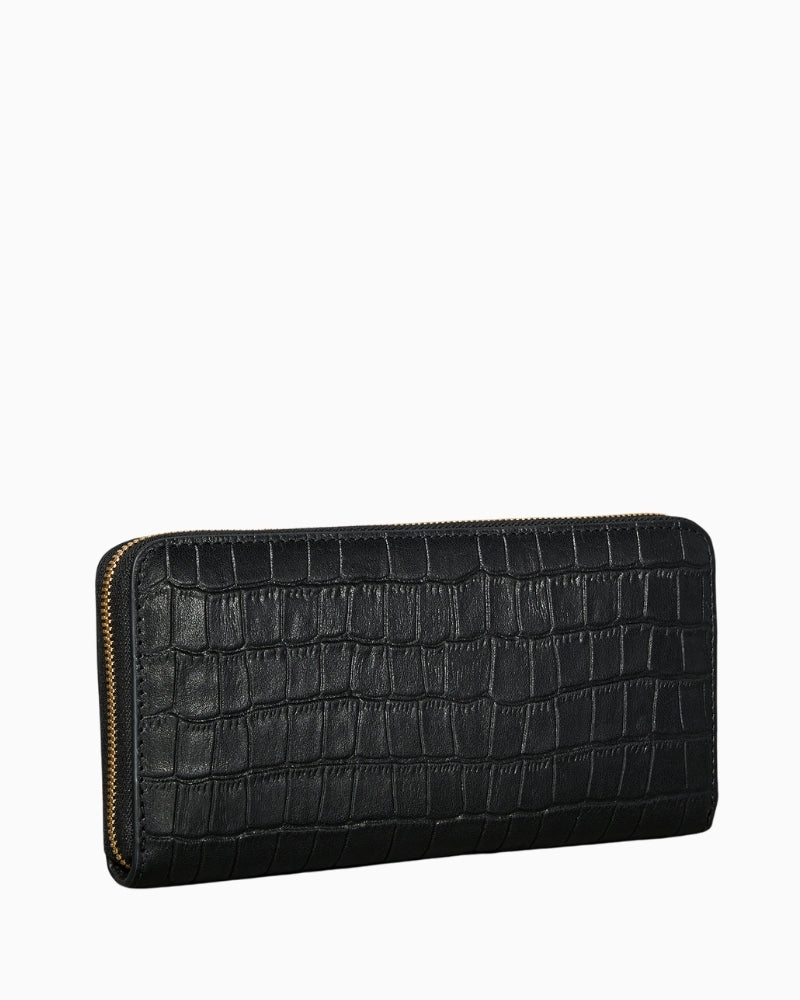 Side profile showing slim structured design and full‑grain leather texture