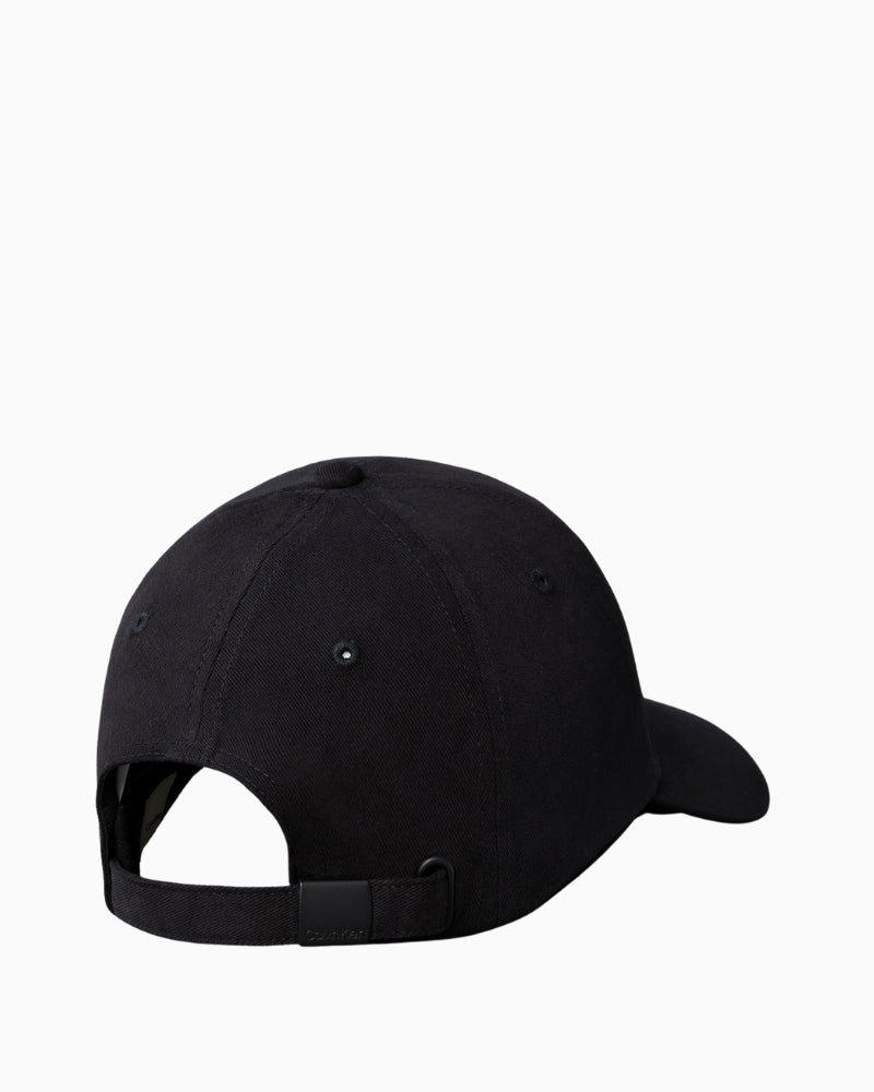 Rear view showing adjustable strap on CK black cap