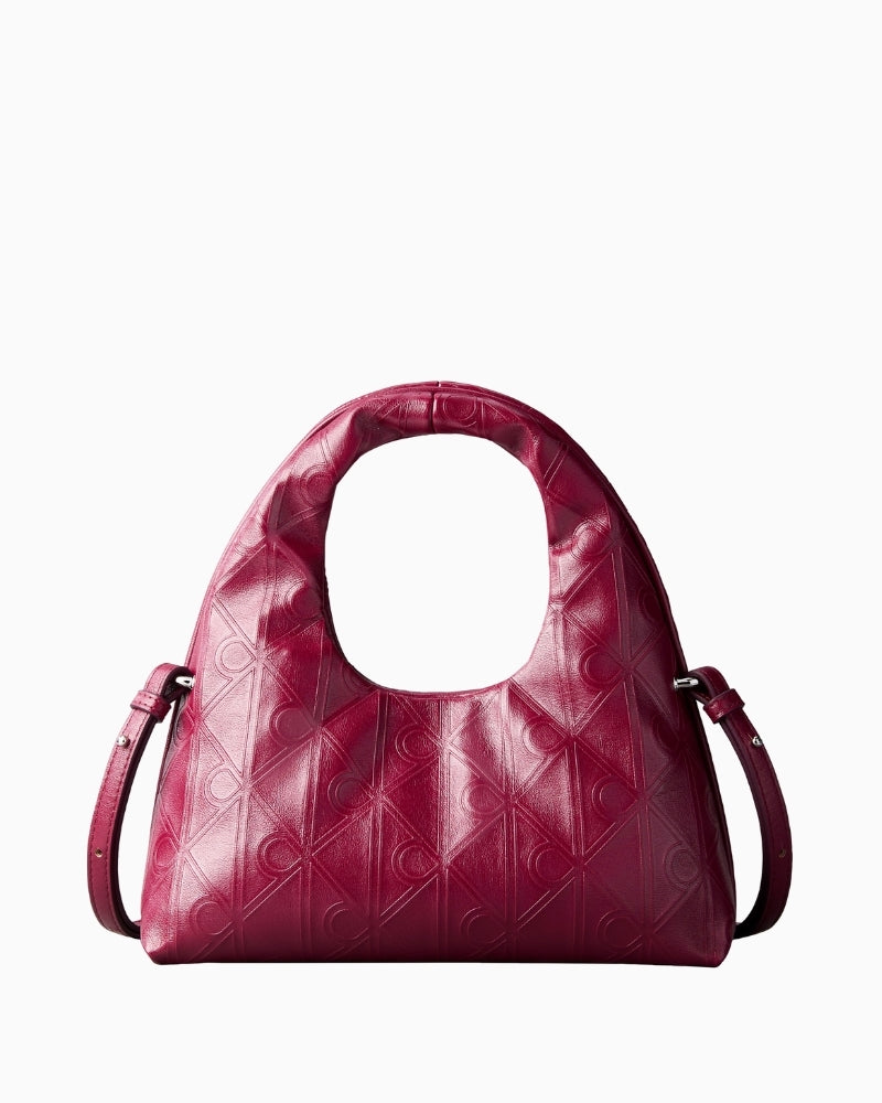 Calvin Klein emblem puffer bag burgundy front view – Áines Boutique
