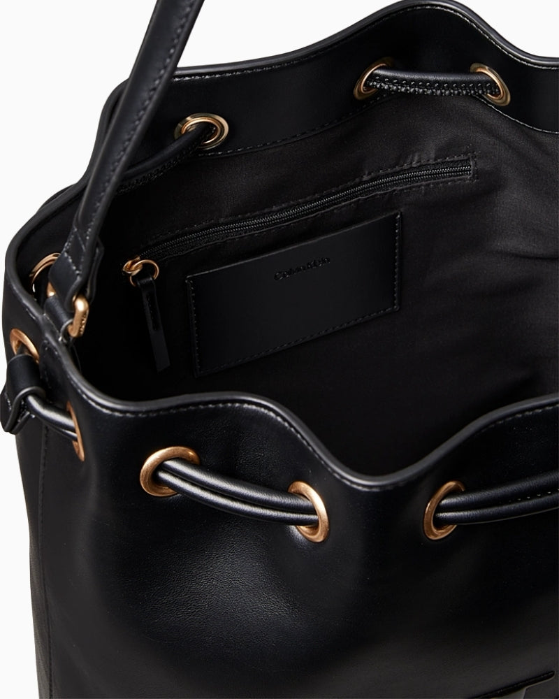 Top view of CK bucket bag with open drawstring detail