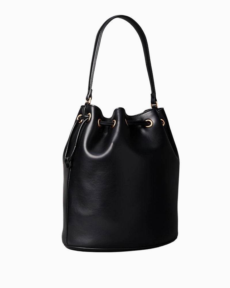 Side view showing structured shape and smooth faux leather finish