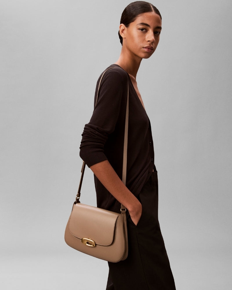Calvin Klein medium taupe crossbody bag on shoulder – Áines Boutique