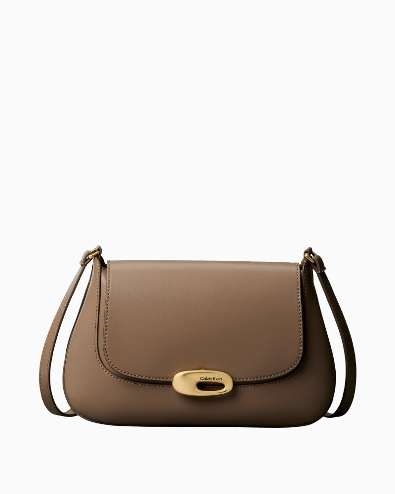 Calvin Klein taupe hardware flap medium crossbody bag front view – Áines Boutique