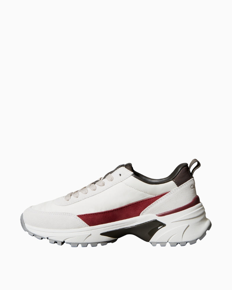 Side view of Hike Runner showing cushioned sole and minimal design