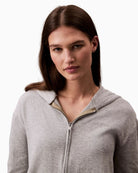 Close-up of Calvin Klein zip hoodie with hood and front pockets