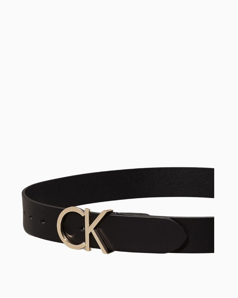 Calvin Klein black leather belt showing signature monogram buckle detail