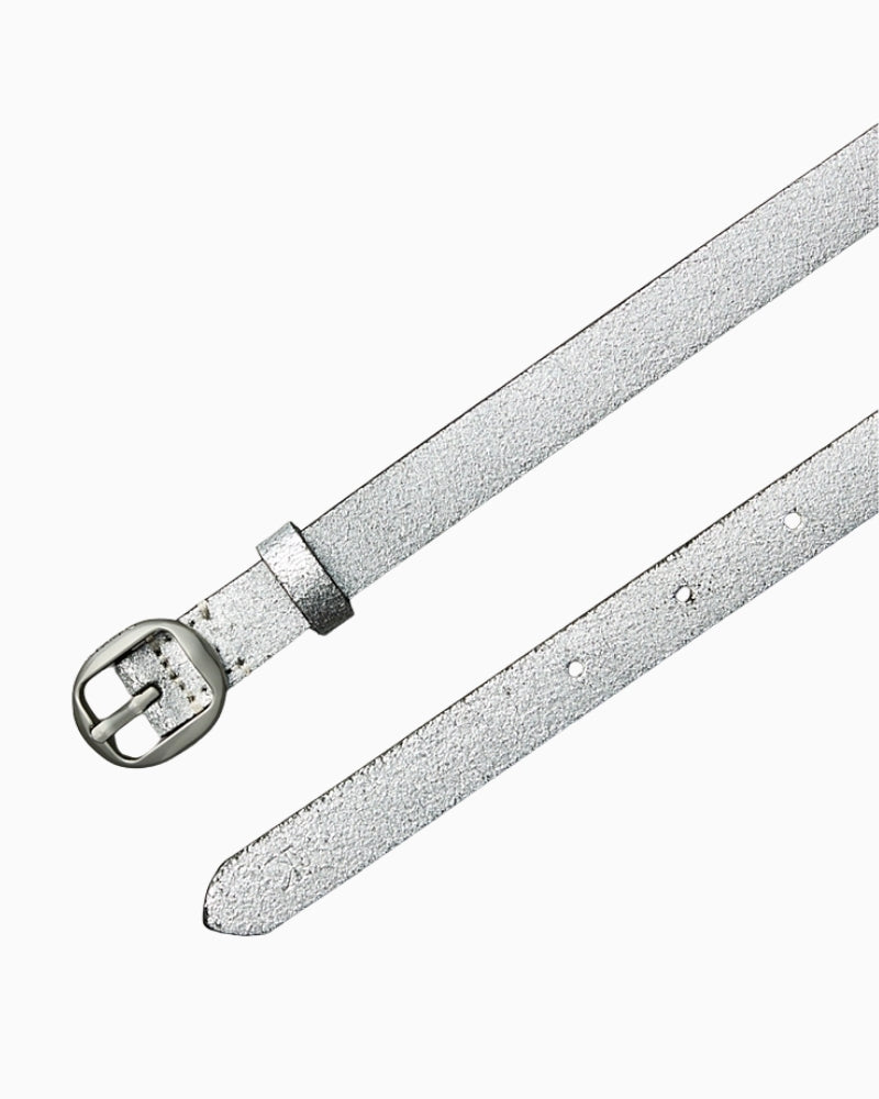 Close-up of pointed end and monogram keeper on slim leather belt