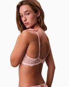 Close-up of lace cup and cross-back strap option on CK Lift Demi Bra