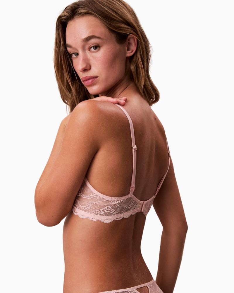 Close-up of lace cup and cross-back strap option on CK Lift Demi Bra