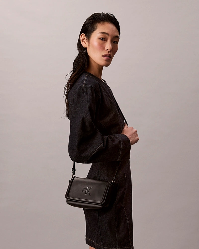 Detail of magnetic flap closure and adjustable strap