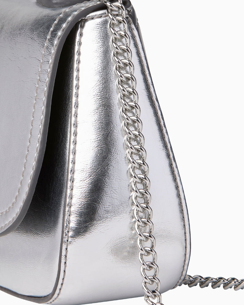 Calvin Klein metallic bag chain strap and side detail – Áines Boutique