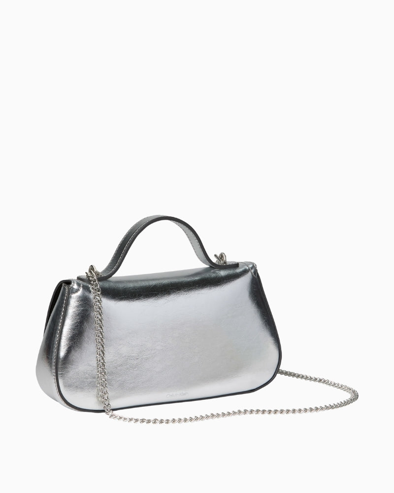 Calvin Klein metallic chain bag angled side view – Áines Boutique