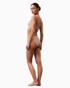 Back view of Calvin Klein bikini briefs showing medium-rise fit and lightweight fabric