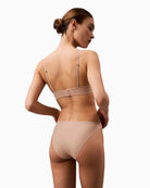 Back view of Calvin Klein bikini briefs showing medium-rise fit and lightweight fabric