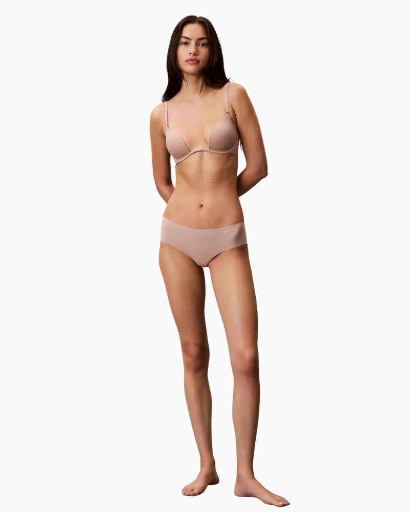 Woman wearing Calvin Klein Perfectly Fit bra under top – Áines Boutique