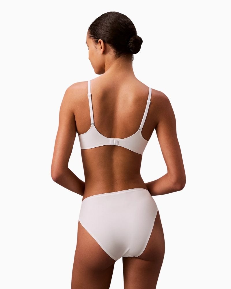 Back view highlighting adjustable straps and hook fastening on Calvin Klein bra