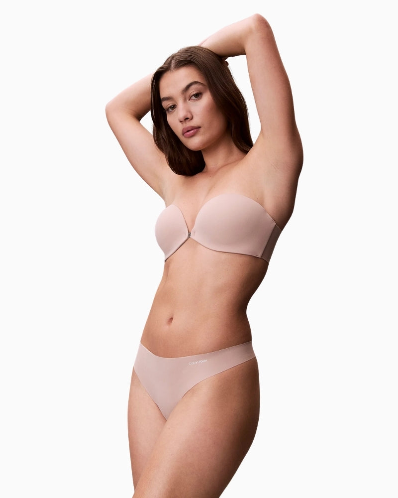Woman wearing Calvin Klein Perfectly Fit strapless push-up bra – Áines Boutique