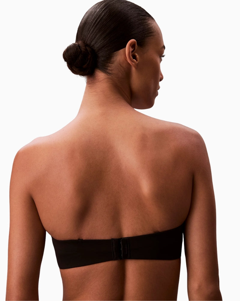 Calvin Klein strapless push-up bra styled with optional shoulder straps